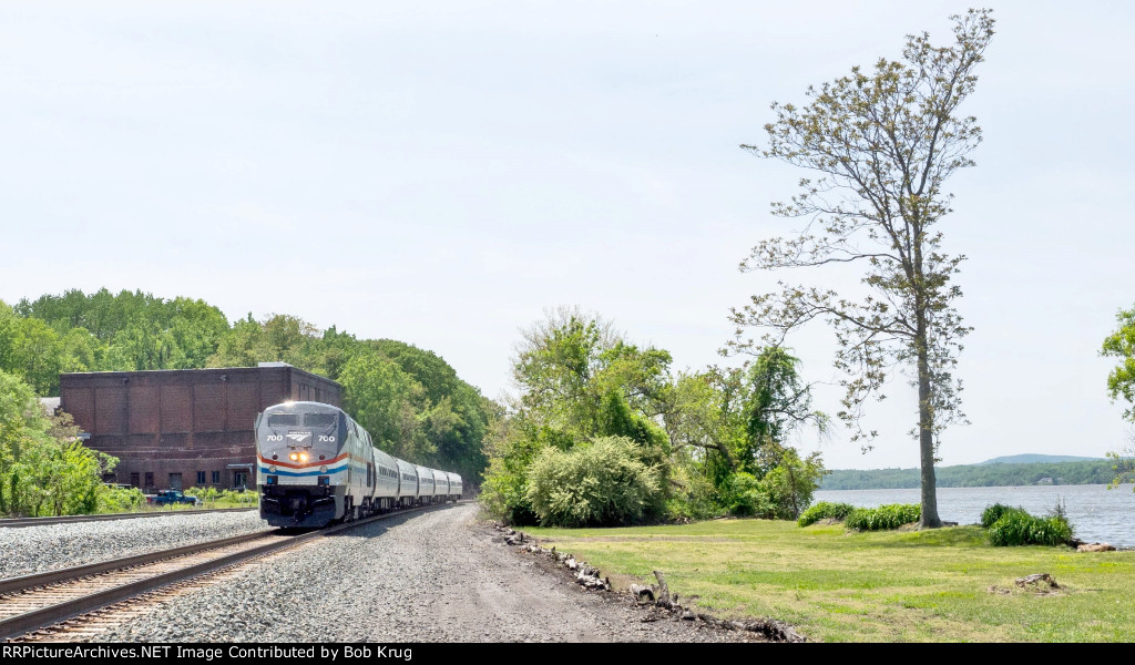 AMTK 700 leads Empire Service train 281 northbound through Germantown, NY along the Hudson River